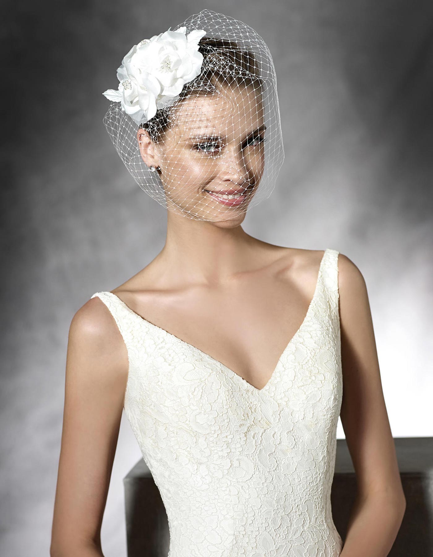 Maricel by Pronovias, lace wedding dress with a v neck.